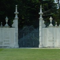 A modest side entrance to the garden of Villa Pisani.